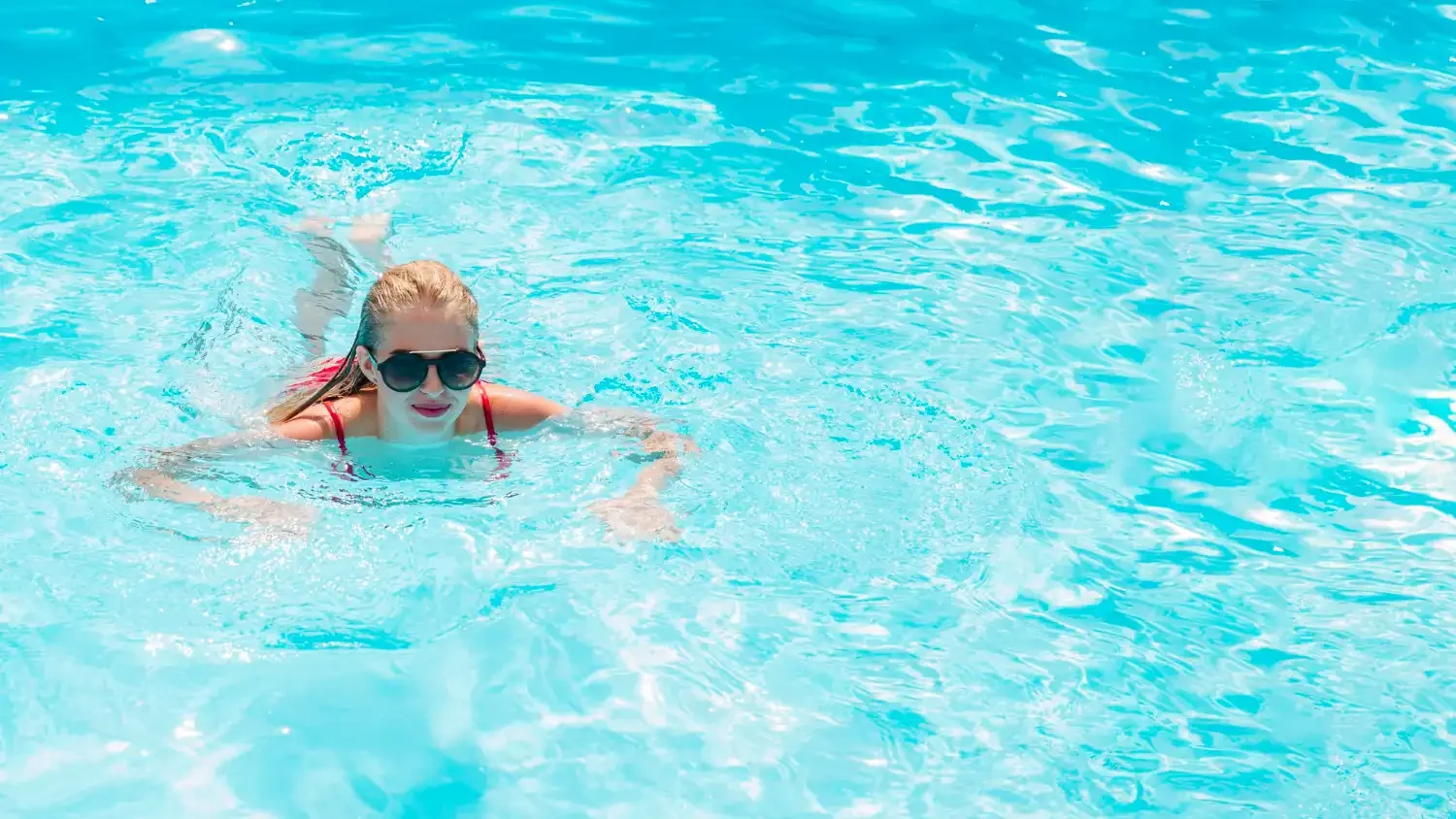 woman swimming in pool